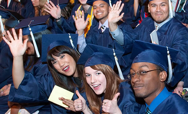 Students in caps and gowns.